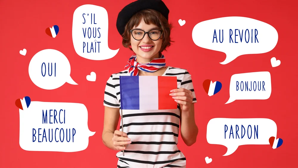 Happy woman in beret holding French flag, surrounded by French phrases like "bonjour" and "merci".